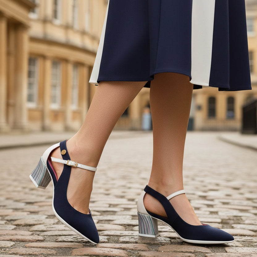 Woman in the street wearing Navy blue and white low heel pointed toe dress shoe