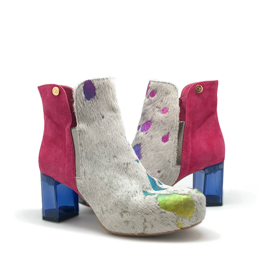 white cowhide rainbow boot