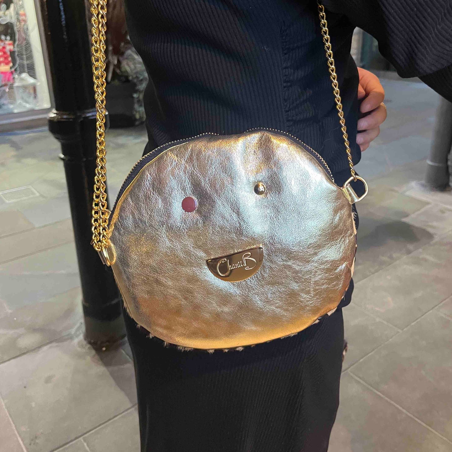 Muse wonky eye chain gold-animal cow handbag