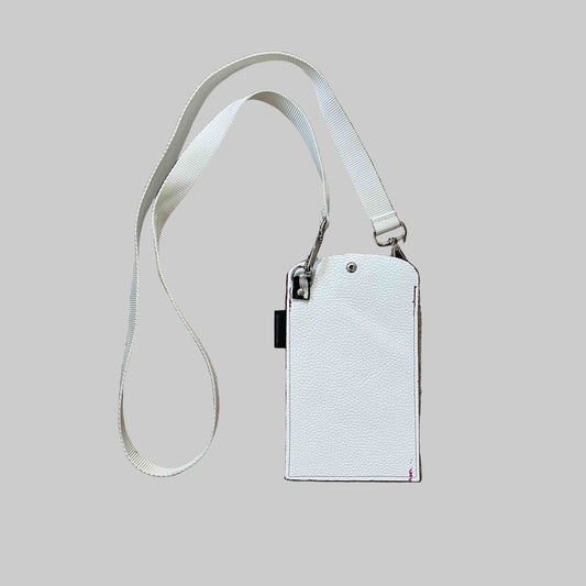 pink and white leather phone holder with cross body strap