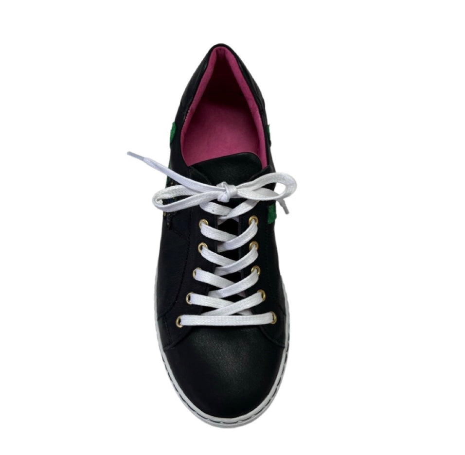 A pair of bespoke footwear called Miel Black B-Line Sneaker