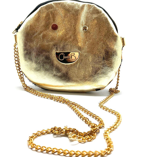 Muse wonky eye chain gold-animal cow handbag